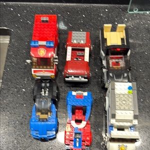 Miscellaneous Lego cars missing a few pieces